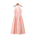 Elegant waist cinched backless neck hanging mid length dress